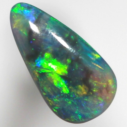 SOLID BLACK OPAL Bright colour partches of orange and green